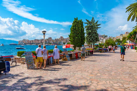 SARANDE, ALBANIA, SEPTEMBER 26, 2019: People are walking on seaside promenade at Sarande, Albaniaのeditorial素材
