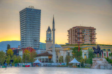 TIRANA, ALBANIA, SEPTEMBER 29, 2019: Sunrise view of Skanderbeg memorial and Ethem Bey mosque in Tirana, Albaniaのeditorial素材