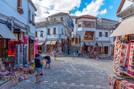 GJIROKASTER, ALBANIA, SEPTEMBER 25, 2019: People are strolling through old town of Gjirokaster, Albaniaのeditorial素材