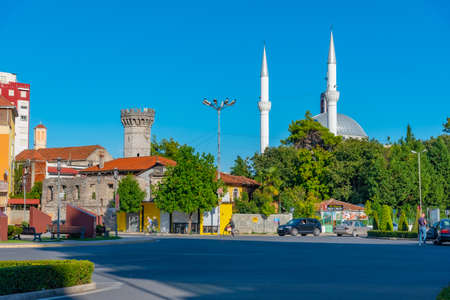 SHKODER, ALBANIA, SEPTEMBER 20, 2019: Ebu Bekr mosque viewed behind Democracy square in Shkoder, Albaniaのeditorial素材