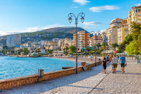 SARANDE, ALBANIA, SEPTEMBER 24, 2019: People are walking on seaside promenade at Sarande, Albaniaのeditorial素材