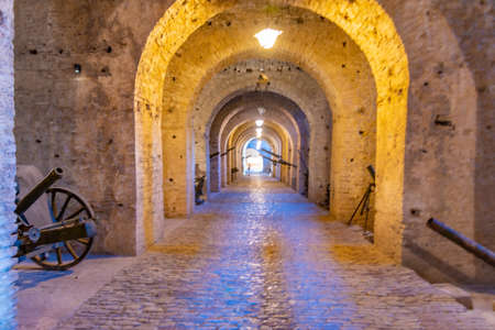 Corridor inside of Gjirokaster castle with display of military cannons, Albania