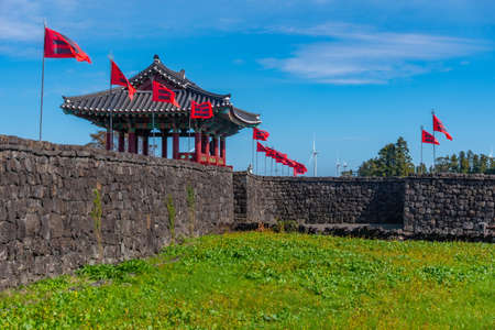 Gate to Seongeup folk village at Jeju island, Republic of Koreaの写真素材