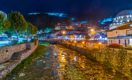 PRIZREN, KOSOVO, SEPTEMBER 19, 2019: Night view of riverside of Bistrica river in center of Prizren, Kosovoのeditorial素材