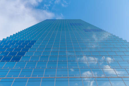 Clouds reflecting on windows of a skyscraper in Seoul, Republic of Koreaの写真素材