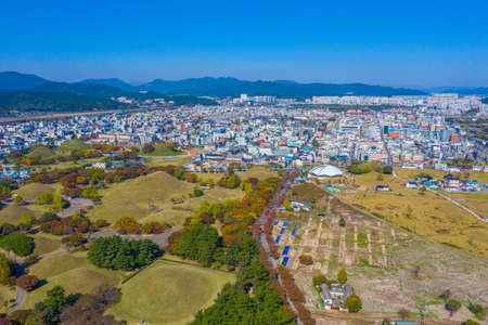 Panorama of Tumuli park and other royal tombs in the center of Korean town Gyeongju