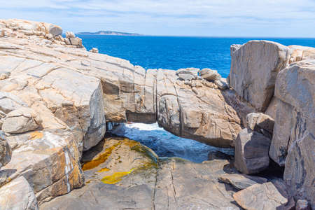 Natural bridge at the Torndirrup National Park, Australiaの写真素材