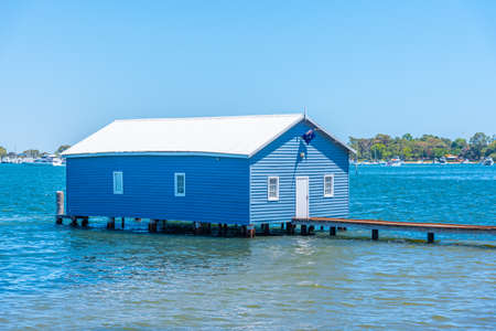 Blue boat house in Perth, Australiaの写真素材