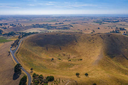 Red rock reserve including several craters of volcanic origin near Colac, Australiaの写真素材