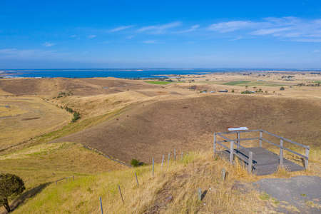 Red rock reserve including several craters of volcanic origin near Colac, Australiaの写真素材