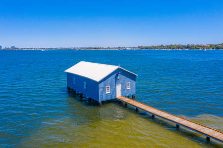 Blue boat house in Perth, Australiaの写真素材
