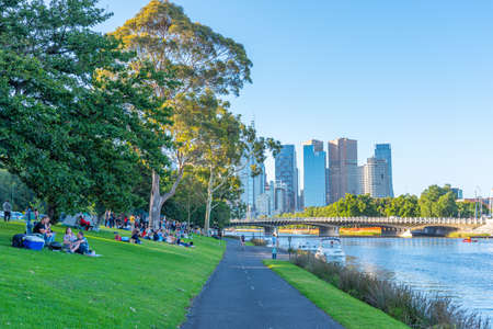 MELBOURNE, AUSTRALIA, DECEMBER 31, 2019: Cityscape of Melbourne behind Yarra river, Australiaの写真素材