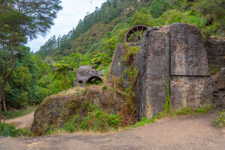 Ruins of industrial heritage related to gold rush at Karangahake Gorge at New Zealandの写真素材