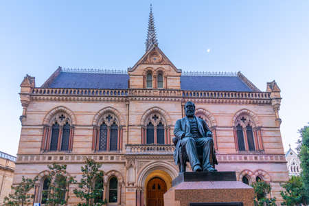 Sunset view of statue of Sir Walter Hughes in front of the University of Adelaide in Australiaのeditorial素材