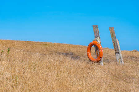 Safety buoy at Katiki point in New Zealandの写真素材