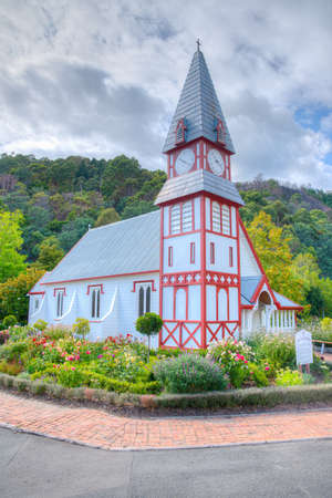 Historial church and windmill at Founders Heritage Park at Nelson, New Zealandのeditorial素材