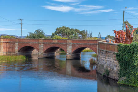 Red bridge in Campbell town in Tasmania, Australiaの写真素材
