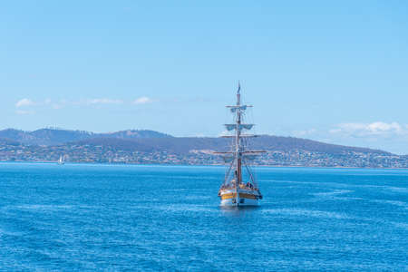 Tourist boat heading towards port of Hobart in Australiaの写真素材