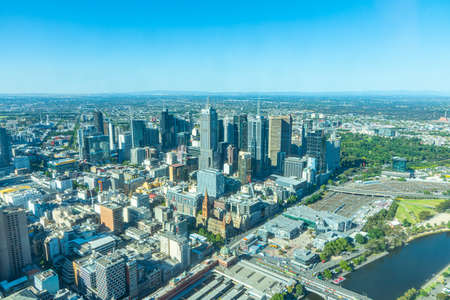 MELBOURNE, AUSTRALIA, JANUARY 1, 2020: Aerial view of downtown Melbourne behind Yarra river, Australiaのeditorial素材