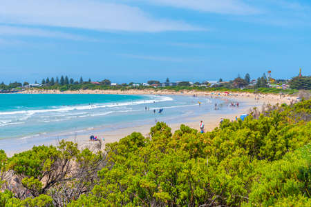 APOLLO BAY, AUSTRALIA, JANUARY 3, 2020: People are enjoying a sunny day on a beach at Apollo Bay, Australiaのeditorial素材
