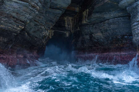 Sea cave at Tasman national park in Tasmania, Australiaの写真素材