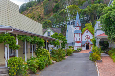 NELSON, NEW ZEALAND, FEBRUARY 5, 2020: Historial church and windmill at Founders Heritage Park at...