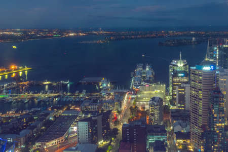 AUCKLAND, NEW ZEALAND, FEBRUARY 19, 2020: Night aerial view of waterfront of Auckland from Sky tower, New Zealandのeditorial素材