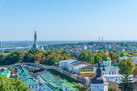 Motherland monument viewed behind Kiev Pechersk lavra in Kiev, Ukraine