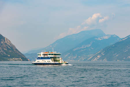 Ferry cruising lago di garda in Italyの写真素材