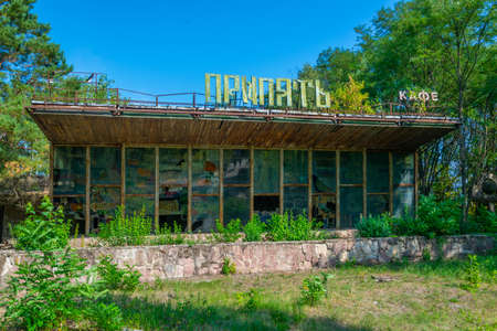 Ruin of riverside cafe in the Ukrainian town Pripyat (sign says Pripyat in cyrilic alphabet)のeditorial素材