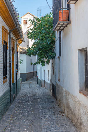 Narrow street in Albaicin district of Granada, Spainの写真素材