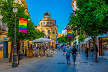 JEREZ DE LA FRONTERA, SPAIN, JUNE 26, 2019: People are strolling on a street at Jerez de la Frontera...