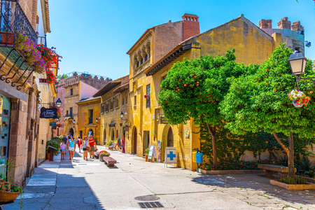 BARCELONA, SPAIN, JUNE 28, 2019: View of a narrow street at Poble Espanyol park representing different architecture and traditions from regions across the country, Spainのeditorial素材