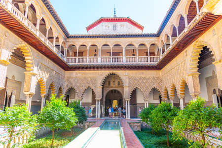 SEVILLA, SPAIN, JUNE 25, 2019: Patio de las Doncellas inside of the Mudejar palace at real alcazar...