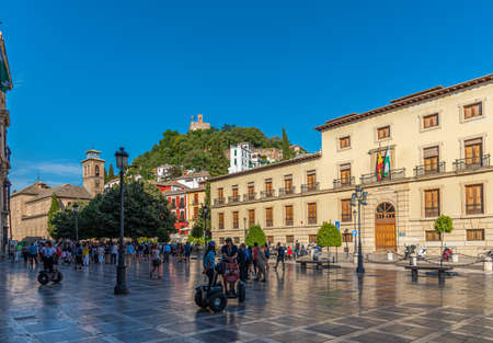 GRANADA, SPAIN, JUNE 22, 2019: People are strolling on square of Santa Ana in Granada, Spainのeditorial素材