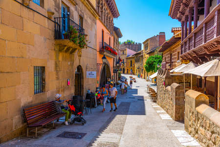 BARCELONA, SPAIN, JUNE 28, 2019: View of a narrow street at Poble Espanyol park representing different architecture and traditions from regions across the country, Spainのeditorial素材