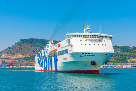 BARCELONA, SPAIN, JUNE 30, 2019: Cruise ship mooring at the port of Barcelona, Spainのeditorial素材