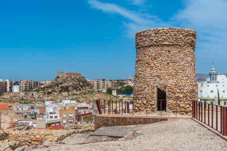 Windmill and fortress on Monte Sacro viewed from archeological park on cerro del molinete in Cartagena, Spainのeditorial素材
