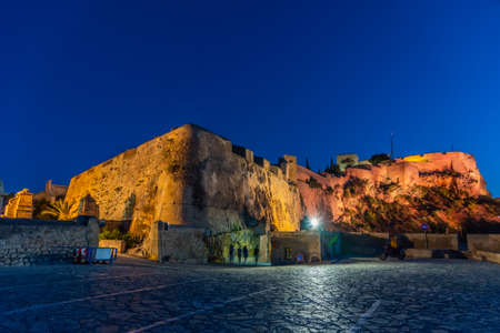 Night view of courtyard of castle of Santa Barbara in Alicante, Spain