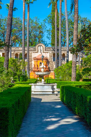 Triton fountain at gardens of Real Alcazar de Sevilla, Spainのeditorial素材