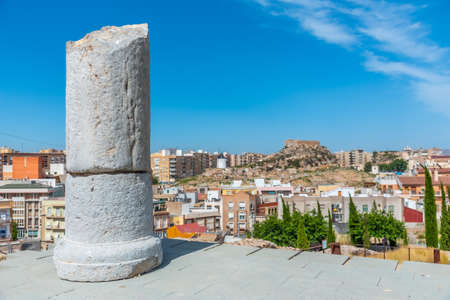 Windmill and fortress on Monte Sacro viewed from archeological park on cerro del molinete in...