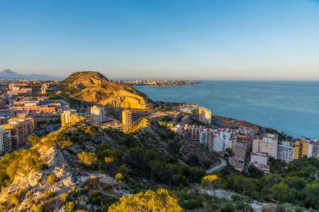 Sunset view of Cap de l'Horta from Castle of Santa Barbara in Alicante, Spainのeditorial素材