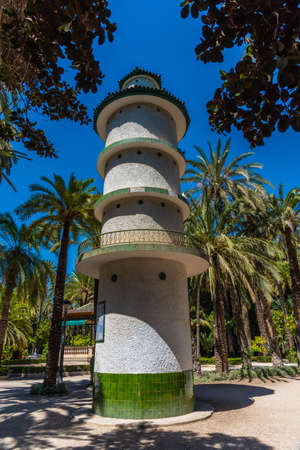 White tower inside of El Palmeral municipal park in Elche, Spainのeditorial素材