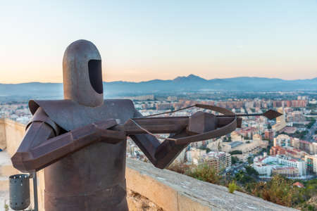 Statue of a solider with crossbow at Castle of Santa Barbara in Alicante, Spainのeditorial素材