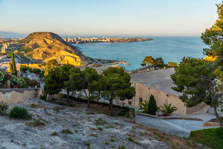 Sunset view of Cap de l'Horta from Castle of Santa Barbara in Alicante, Spainのeditorial素材
