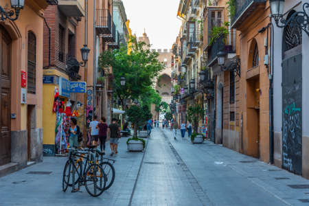 VALENCIA, SPAIN, JUNE 17, 2019:  Carrer dels Serrans street leading to Torre de Serranos gate in Valencia, Spainのeditorial素材