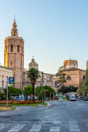 VALENCIA, SPAIN, JUNE 17, 2019: Cathedral in Valencia viewed from Plaza de la Reina, Spainのeditorial素材