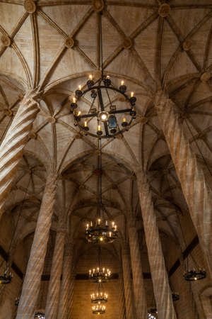 VALENCIA, SPAIN, JUNE 17, 2019: The hall of columns inside of Lonja de la Seda building in Valencia,...