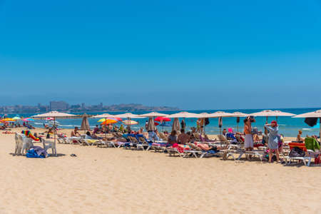 ALICANTE, SPAIN, JUNE 18, 2019: People are enjoying a sunny day on Postiguet beach in Alicante in Spainのeditorial素材