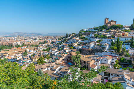 Panorama of Albaicin dominated by San Nicolas church in Granada, Spain